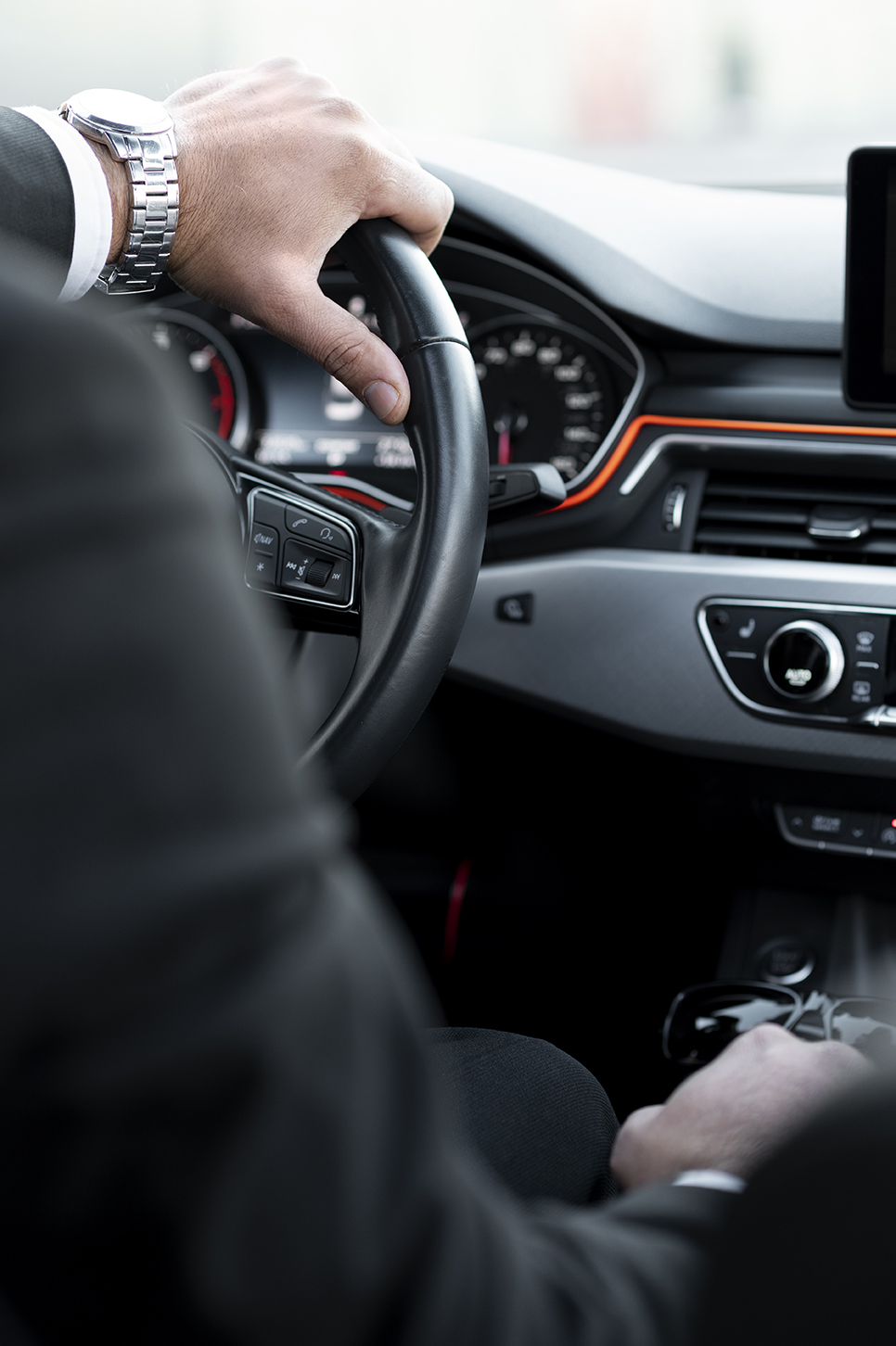Driver dressed elegant costume